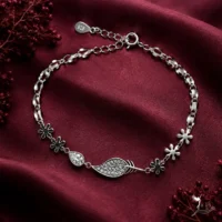 دستبند نقره زنانه طرح پر و اشک و گل